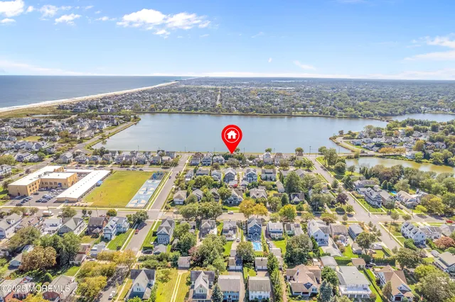 a view of a swimming pool and an outdoor space