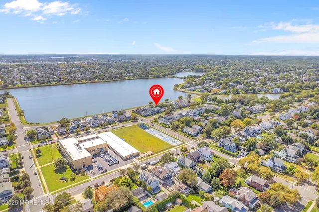 an aerial view of a house with a outdoor space