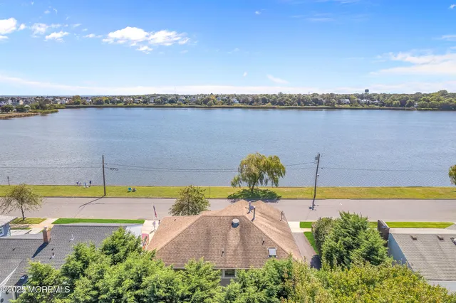 an aerial view of beach and city