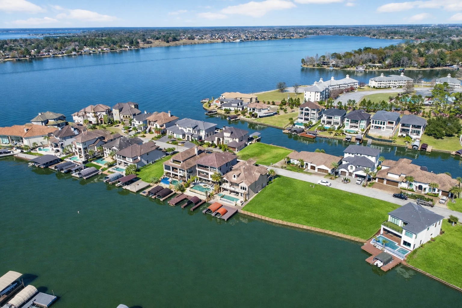 12349 Tramonto Conroe, TX 77304 - Photo 46 of 50 a view of a lake with a house
