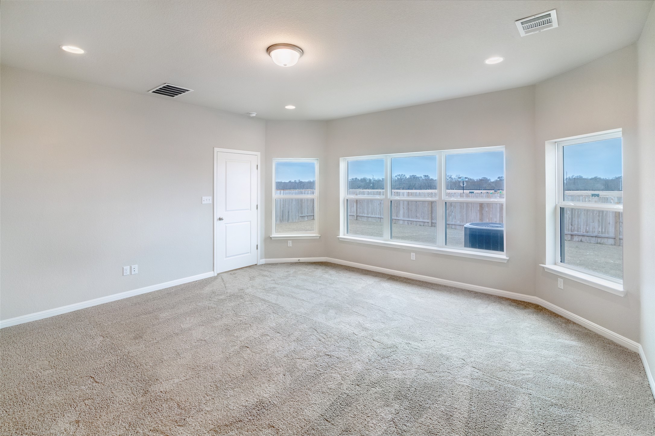 113 Watercourse Way Bastrop, TX 78602 - Photo 16 of 32 a view of an empty room with a window