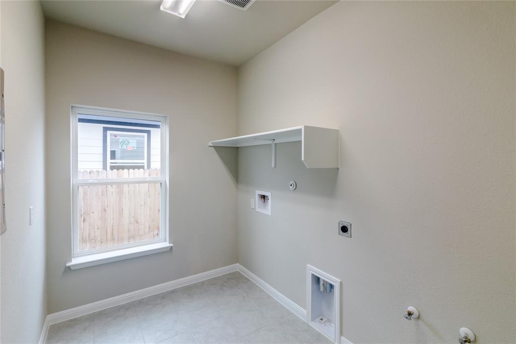 113 Watercourse Way Bastrop, TX 78602 - Photo 29 of 32 a view of an empty room with a window