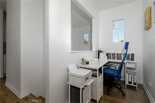 a view of a workspace with furniture