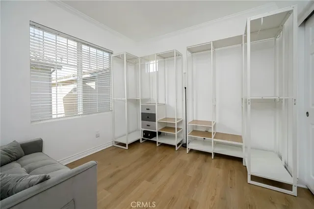 a view of room with furniture and air conditioner window