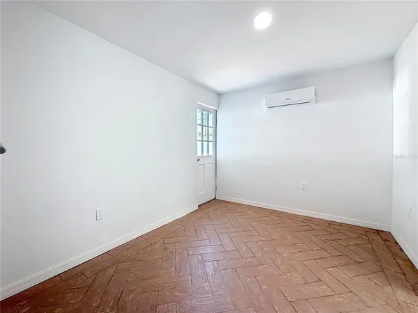 an empty room with windows