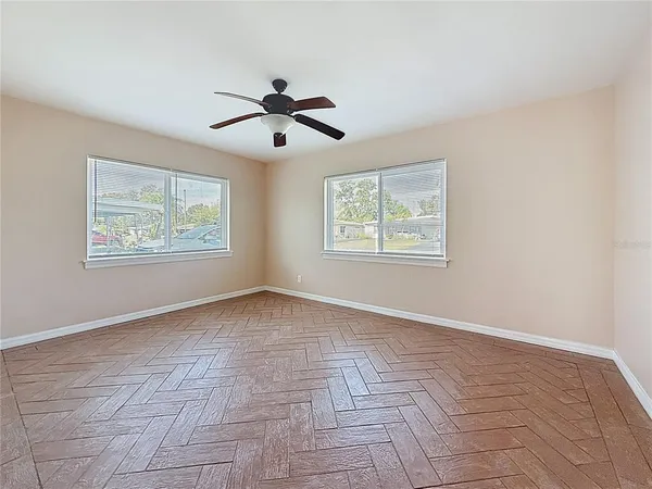 a view of an empty room with a window