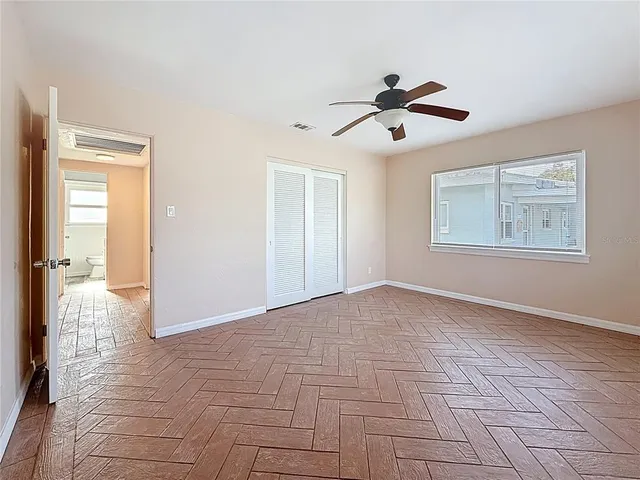 a view of a big room with carpet