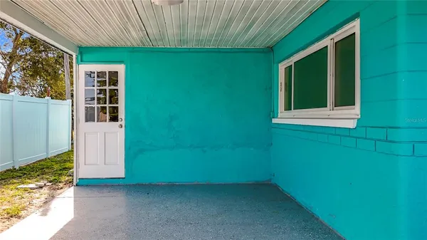 a view of a water fountain and a big yard