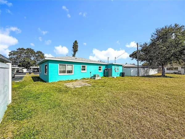 aerial view of multiple houses with outdoor space