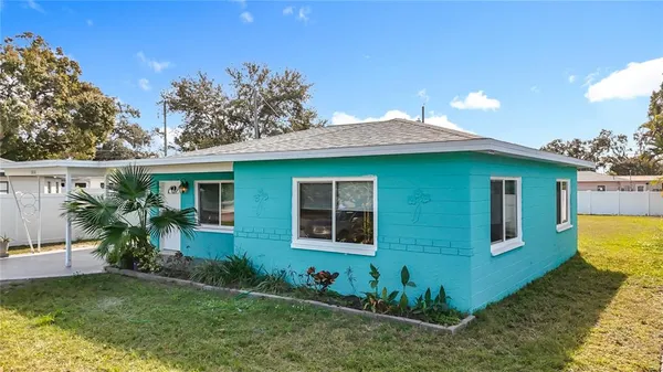 a view of a city with mountains in the background