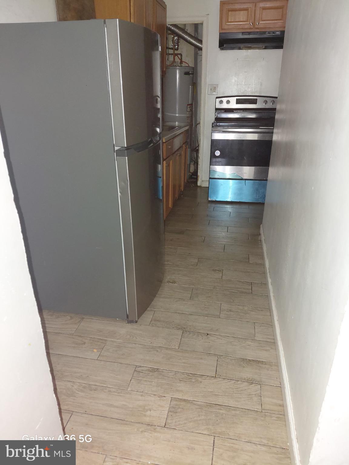 2328 Nicholson Street Southeast Washington, DC 20020 - Photo 18 of 26 a view of storage and utility room with refrigerator