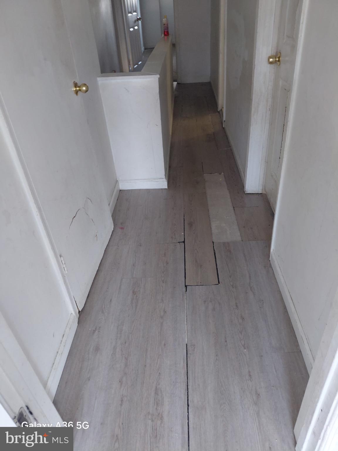 2328 Nicholson Street Southeast Washington, DC 20020 - Photo 25 of 26 a view of a kitchen from a hallway
