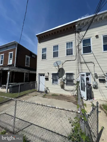 a front view of a house with garage