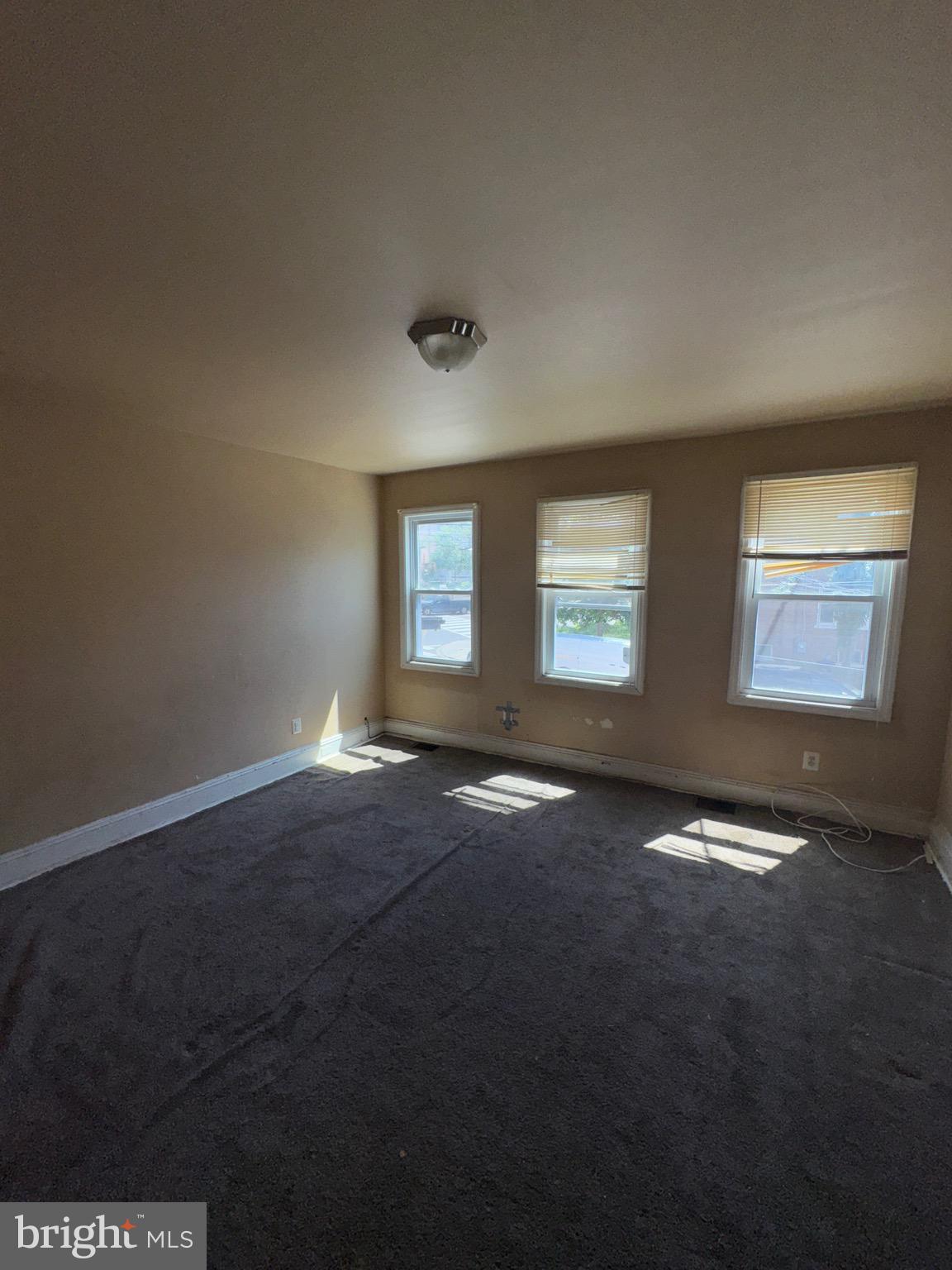 2328 Nicholson Street Southeast Washington, DC 20020 - Photo 7 of 10 a view of an empty room with windows