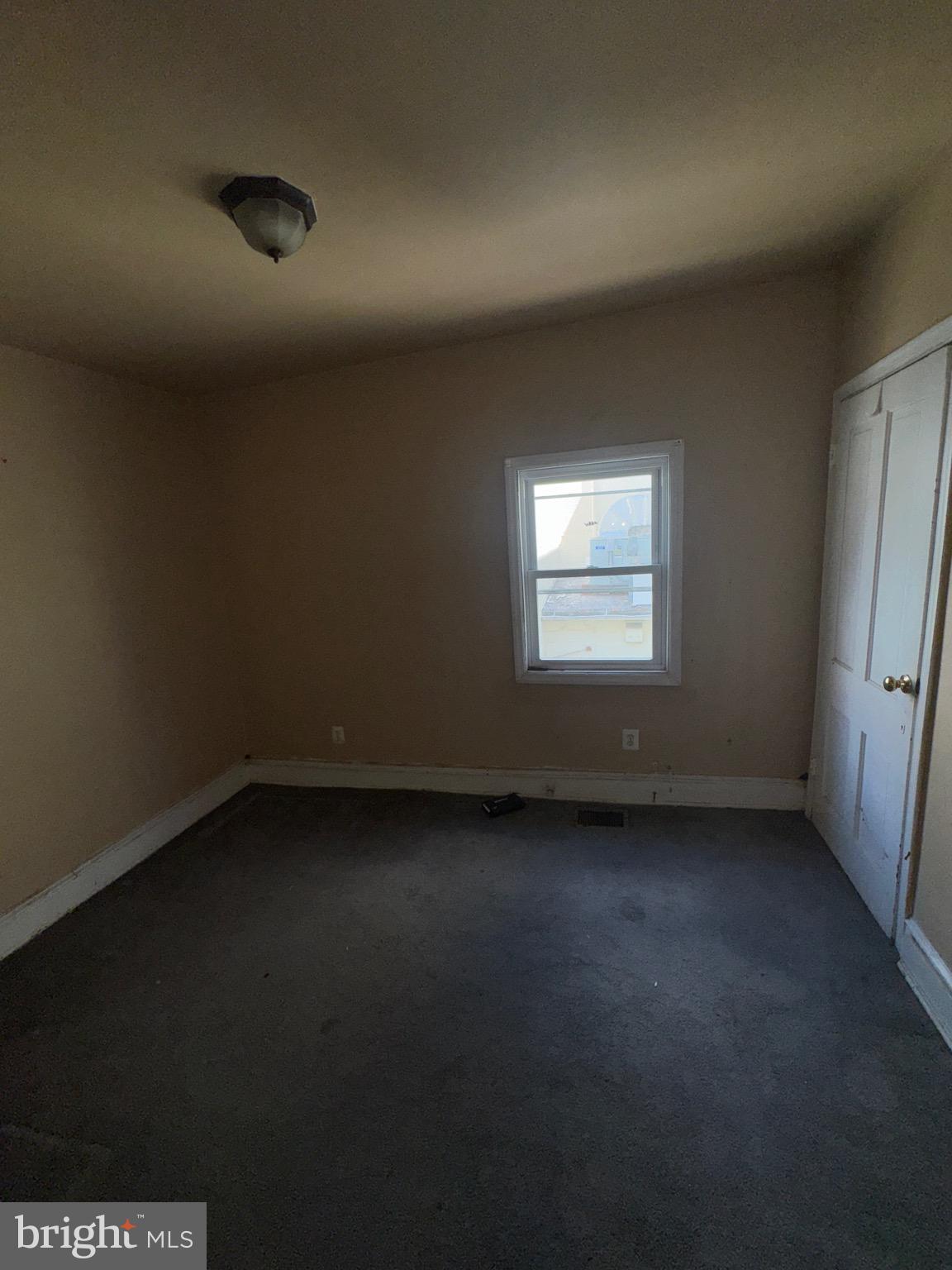 2328 Nicholson Street Southeast Washington, DC 20020 - Photo 8 of 10 a view of a window in an empty room
