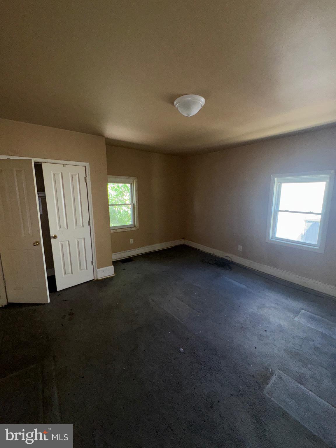 2328 Nicholson Street Southeast Washington, DC 20020 - Photo 9 of 10 an empty room with windows
