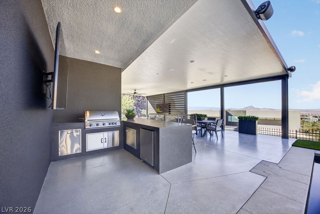 1456 Solitude Ridge Drive Henderson, NV 89012 - Photo 77 of 94 Entertainers Dream Yard with Grill, Ice Drawer, Quartz Counters & Televison