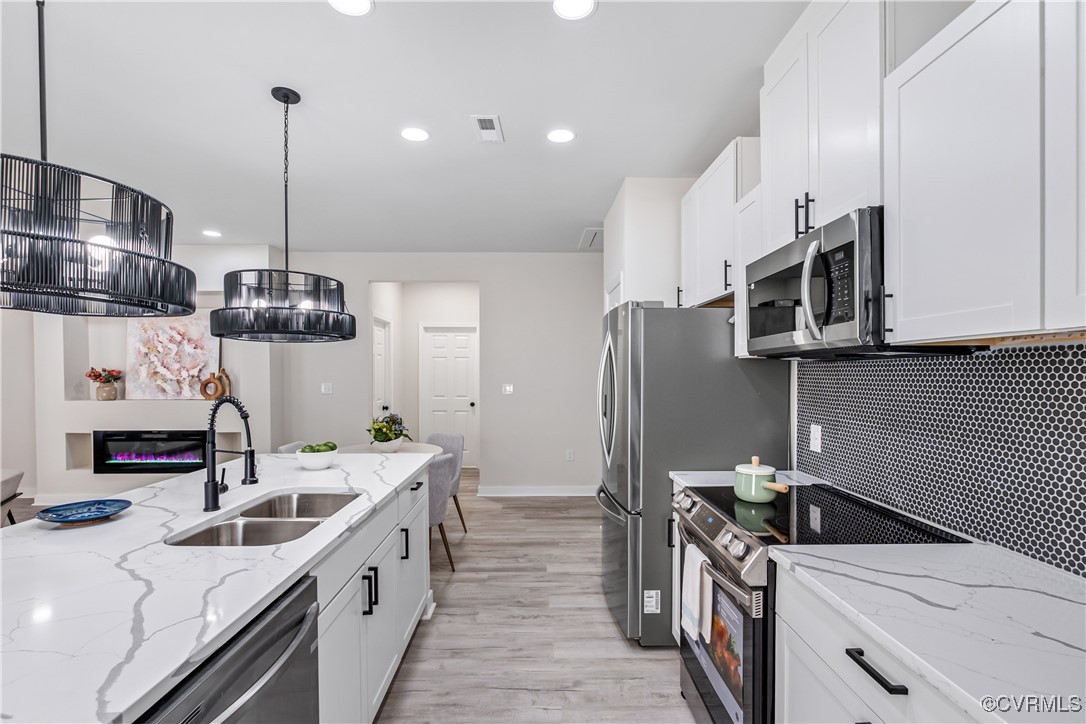 1125 Rome Street Petersburg, VA 23803 - Photo 15 of 38 Kitchen featuring stainless steel appliances, whit