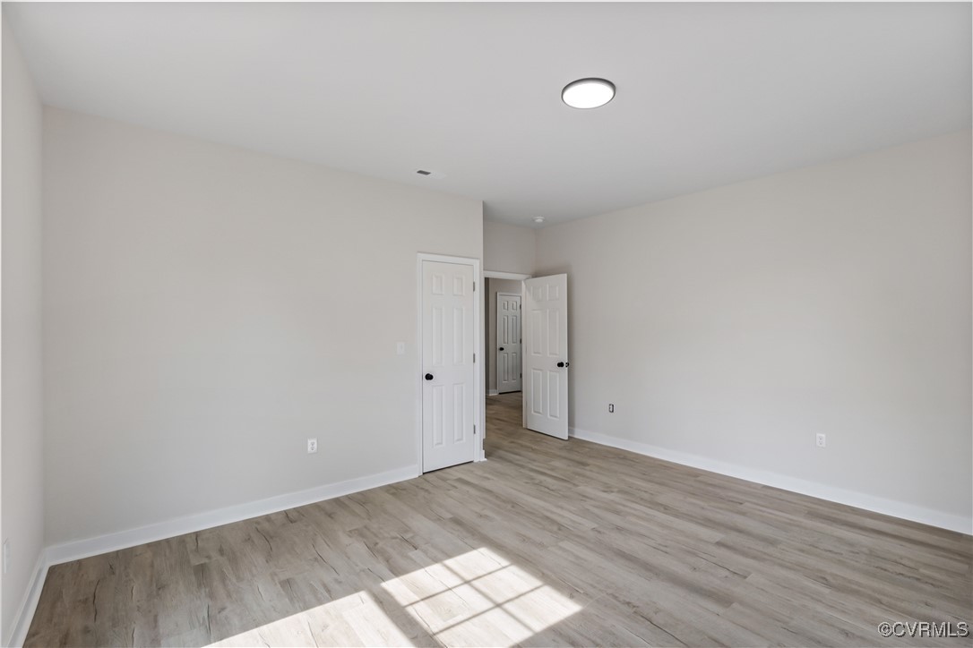 1125 Rome Street Petersburg, VA 23803 - Photo 26 of 38 Spare room featuring light hardwood / wood-style f