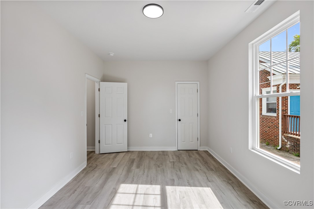 1125 Rome Street Petersburg, VA 23803 - Photo 28 of 38 Empty room featuring light hardwood / wood-style f