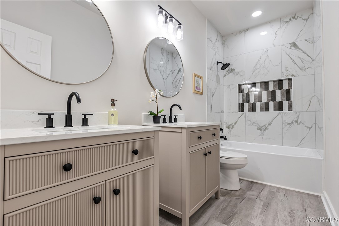 1125 Rome Street Petersburg, VA 23803 - Photo 29 of 38 Full bathroom with toilet, vanity, tiled shower /