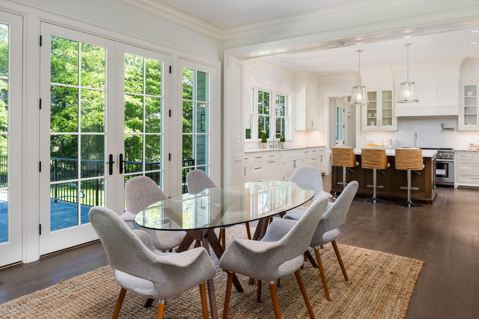49 Byfield Lane Greenwich, CT 06830 - Photo 7 of 14 a dining room with furniture window and wooden floor