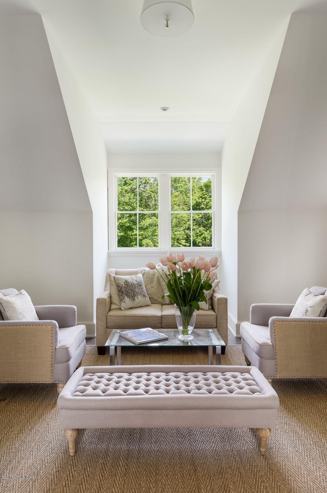 49 Byfield Lane Greenwich, CT 06830 - Photo 10 of 14 a living room with furniture and a potted plant