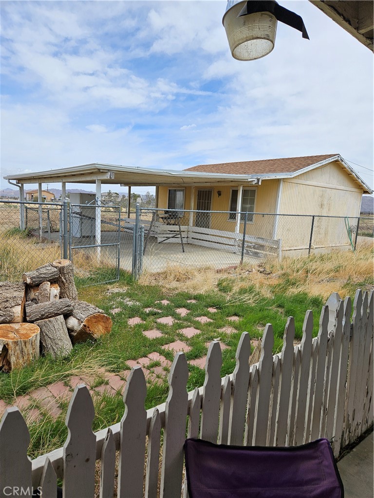 11175 Tyee Road Apple Valley, CA 92308 - Photo 11 of 31 a front view of house with a garden