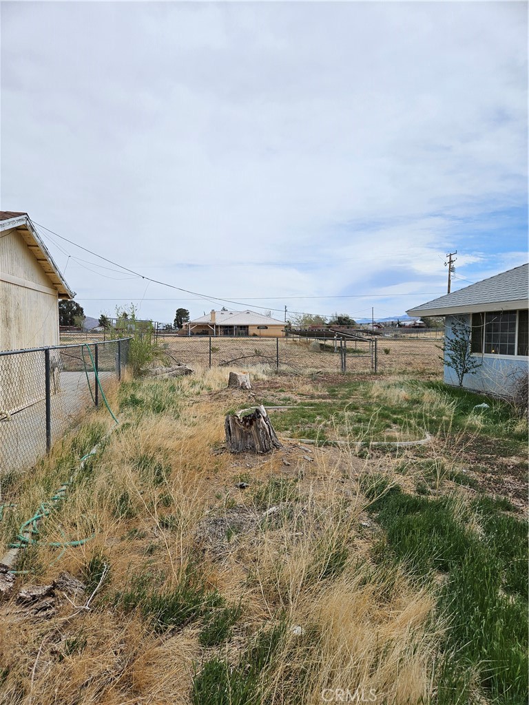 11175 Tyee Road Apple Valley, CA 92308 - Photo 15 of 31 a view of a lake with houses in the back