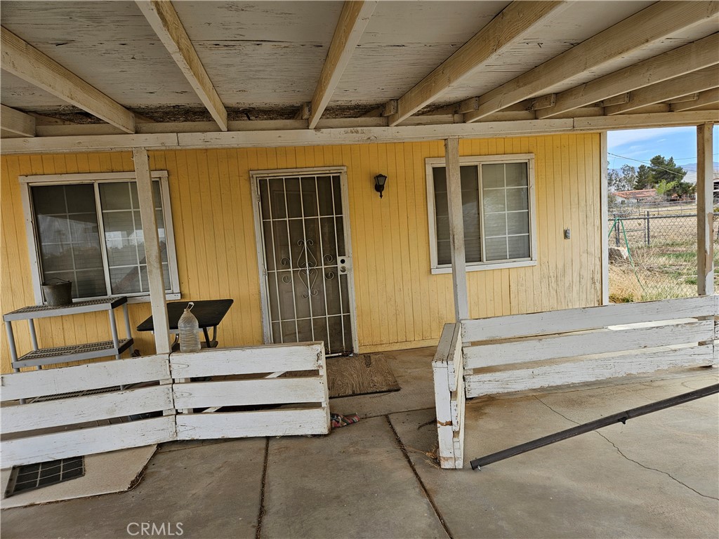 11175 Tyee Road Apple Valley, CA 92308 - Photo 16 of 31 a view of wooden door