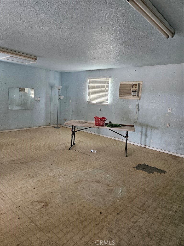 11175 Tyee Road Apple Valley, CA 92308 - Photo 19 of 31 a view of a room with gym equipment