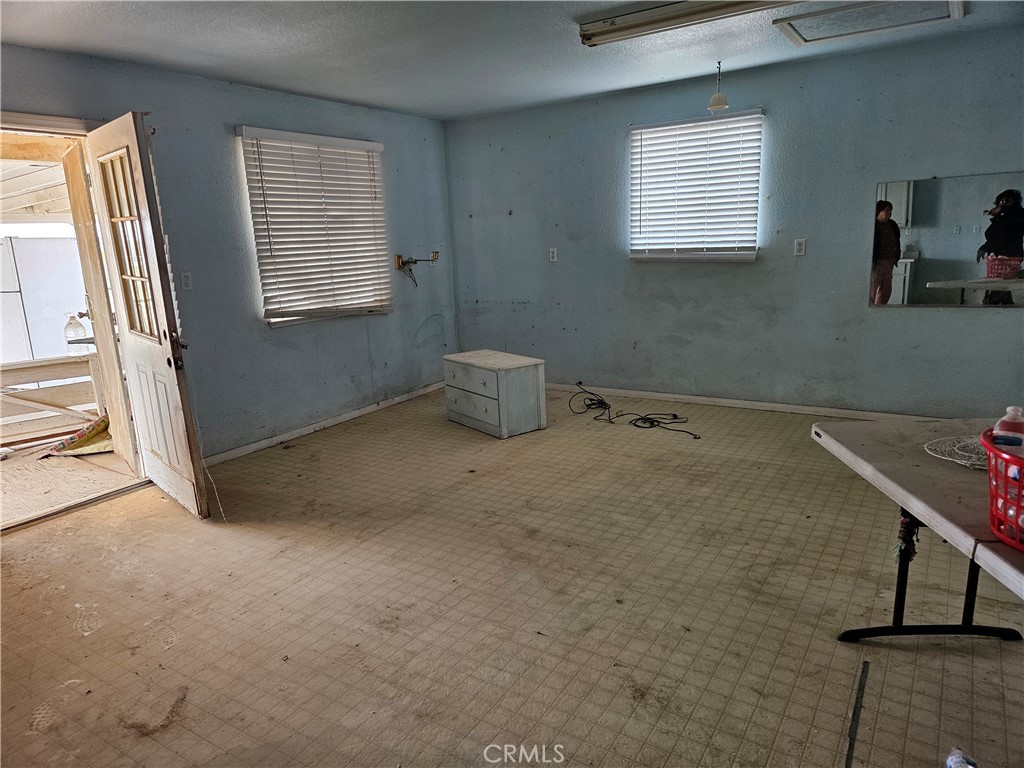 11175 Tyee Road Apple Valley, CA 92308 - Photo 21 of 31 a room with window and a view of living room