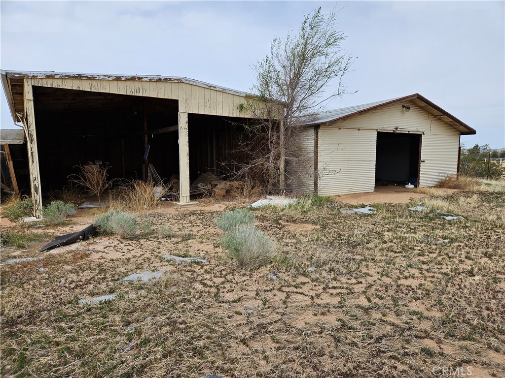 11175 Tyee Road Apple Valley, CA 92308 - Photo 22 of 31 a house with yard in front of it