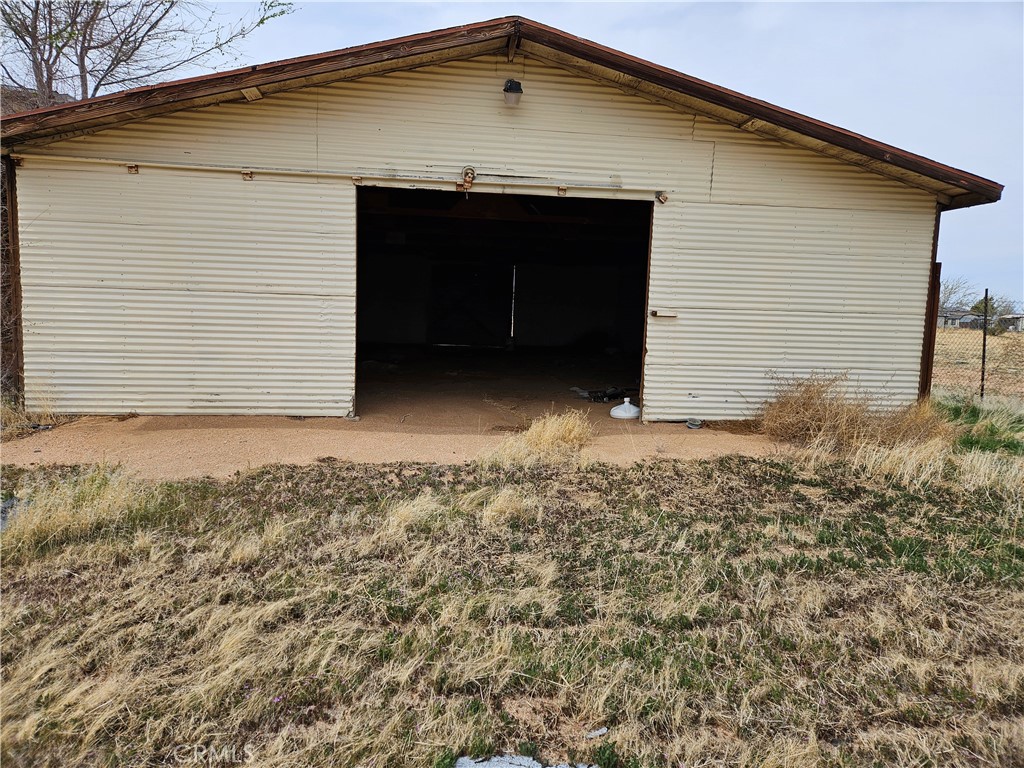 11175 Tyee Road Apple Valley, CA 92308 - Photo 23 of 31 a front view of a house with a yard
