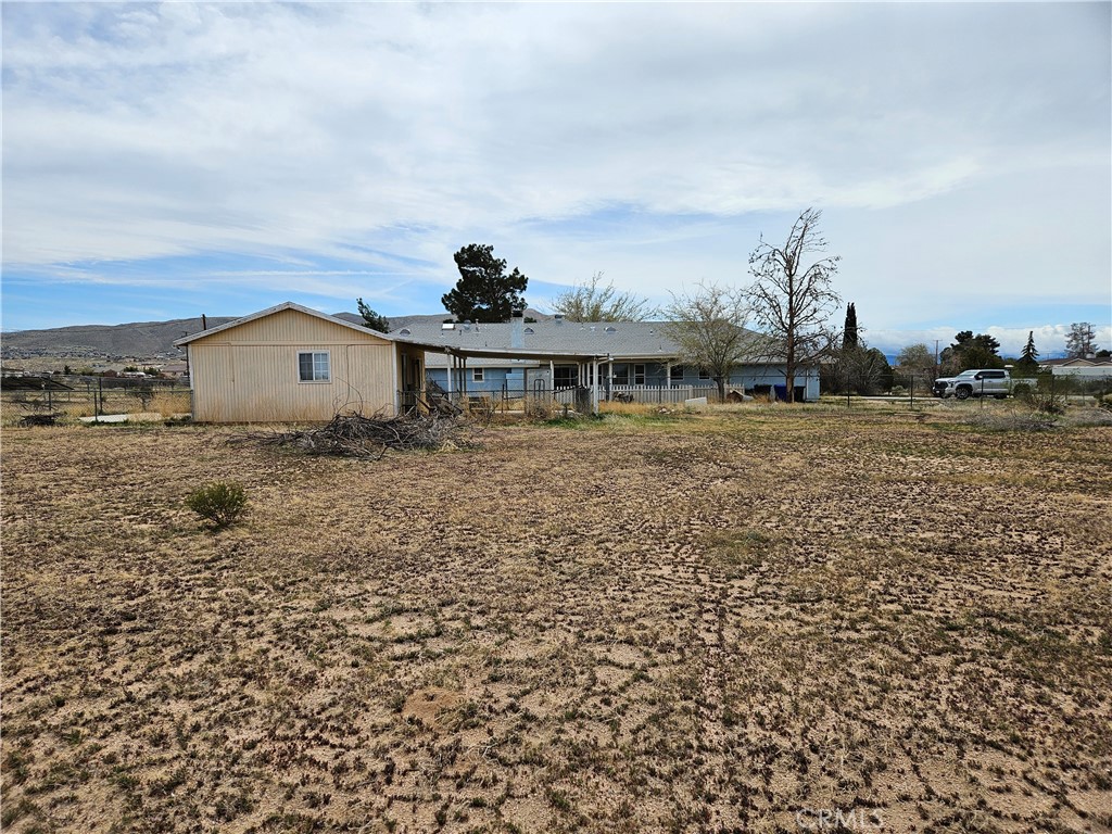 11175 Tyee Road Apple Valley, CA 92308 - Photo 27 of 31 a view of residential houses with outdoor space
