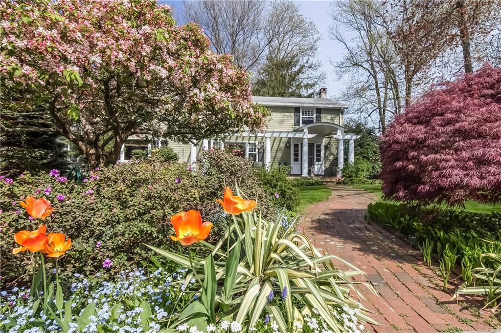 32 Tuxis Road Madison, CT 06443 - Photo 1 of 1 front view of a house with a yard