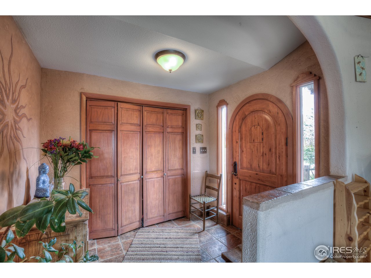1950 Riverside Avenue Boulder, CO 80304 - Photo 7 of 21 a view of a porch with a furniture and floor to ceiling window