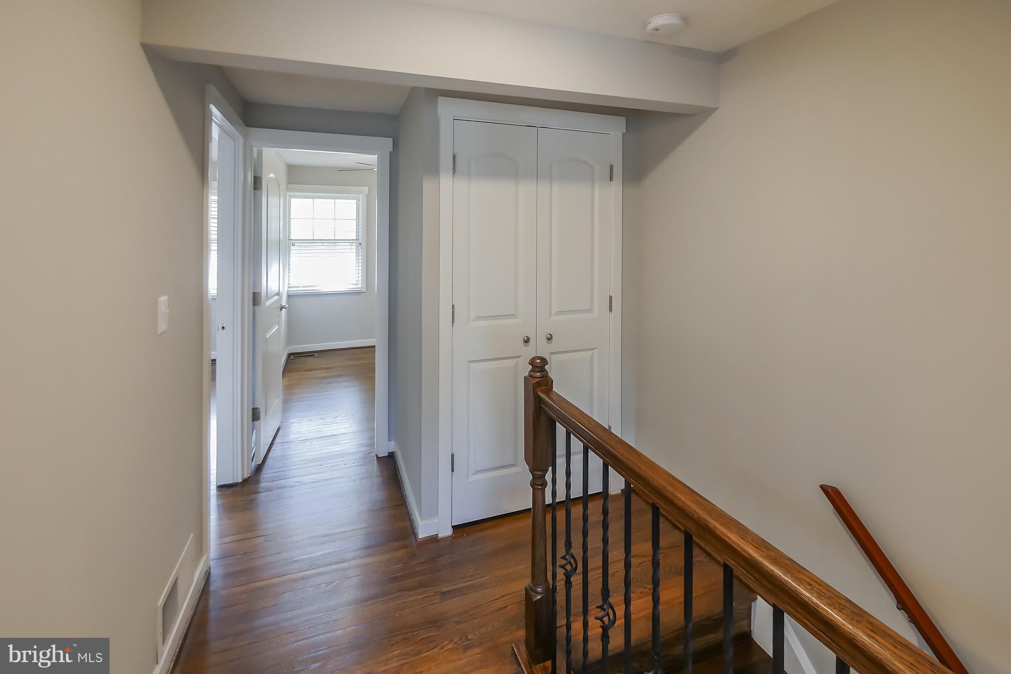 4410 Annapolis Road Baltimore, MD 21227 - Photo 15 of 31 a view of a hallway with wooden floor