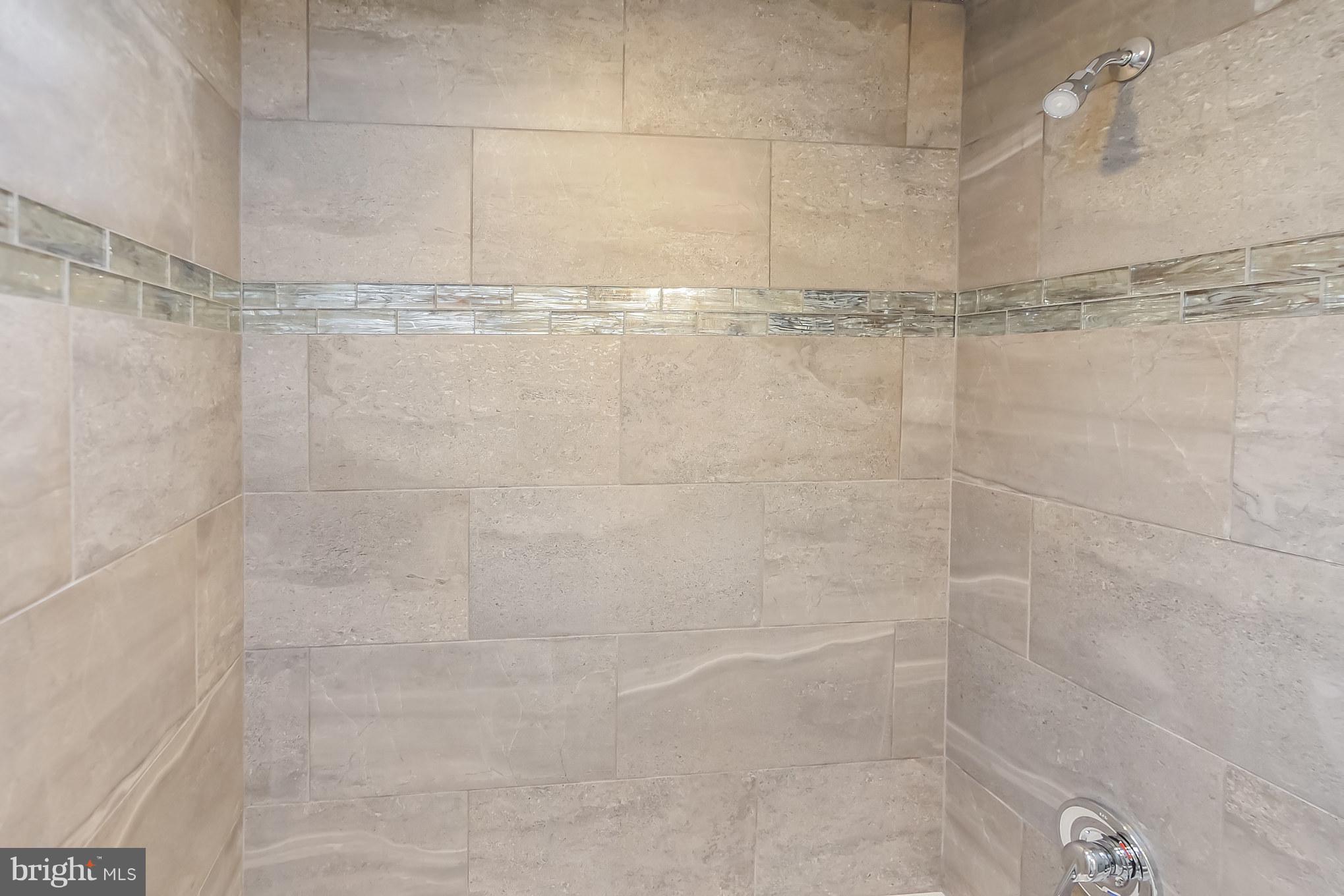 4410 Annapolis Road Baltimore, MD 21227 - Photo 26 of 31 a bathroom with a shower