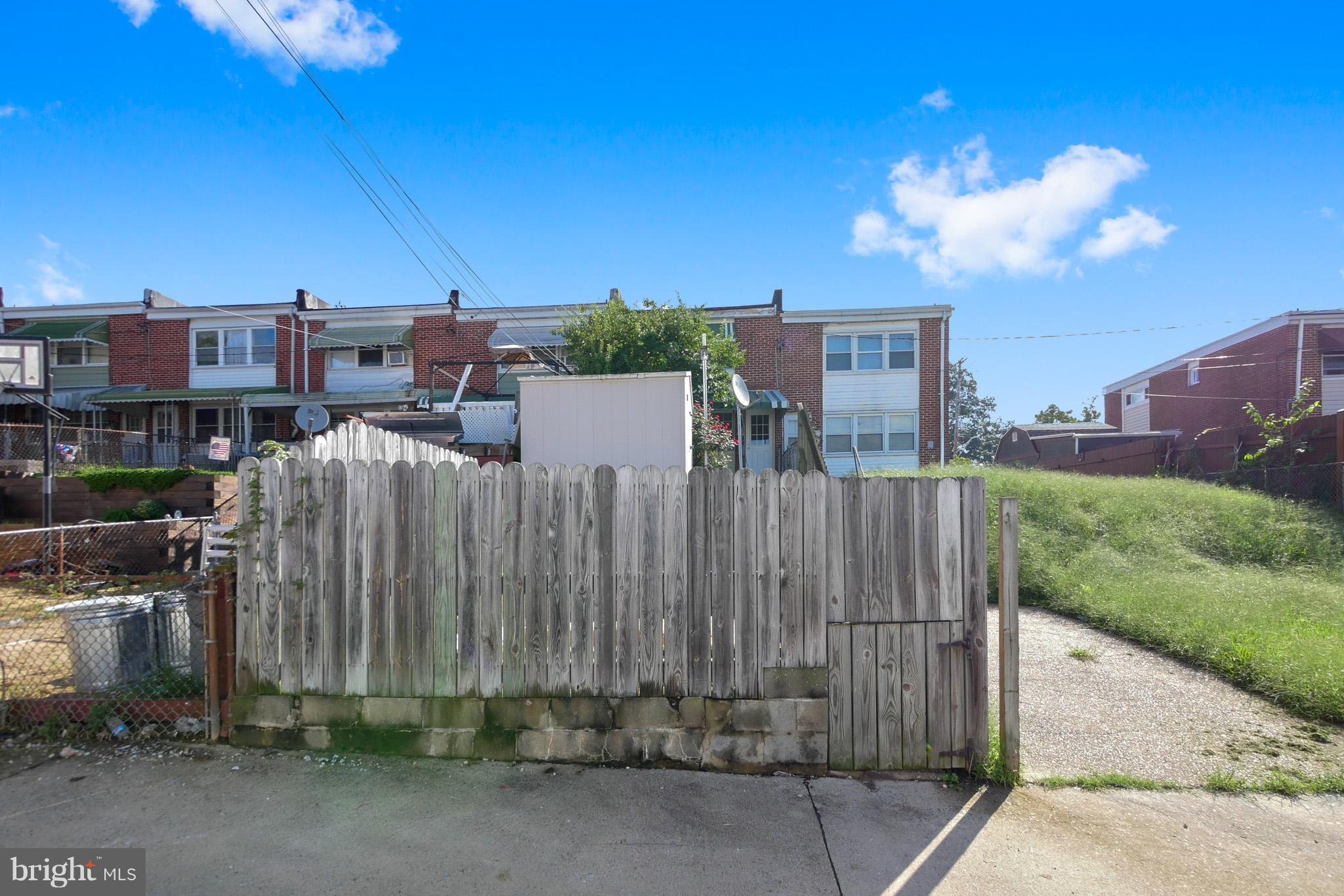 4410 Annapolis Road Baltimore, MD 21227 - Photo 29 of 31 a view of a house with a backyard