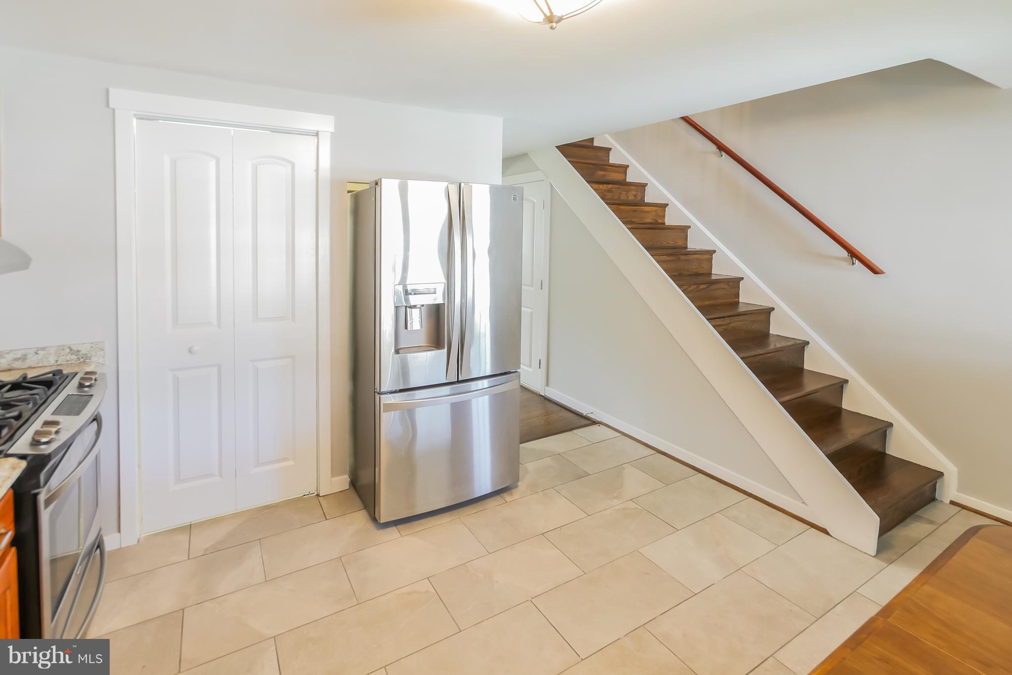 4410 Annapolis Road Baltimore, MD 21227 - Photo 10 of 31 a view of kitchen with furniture and an entryway