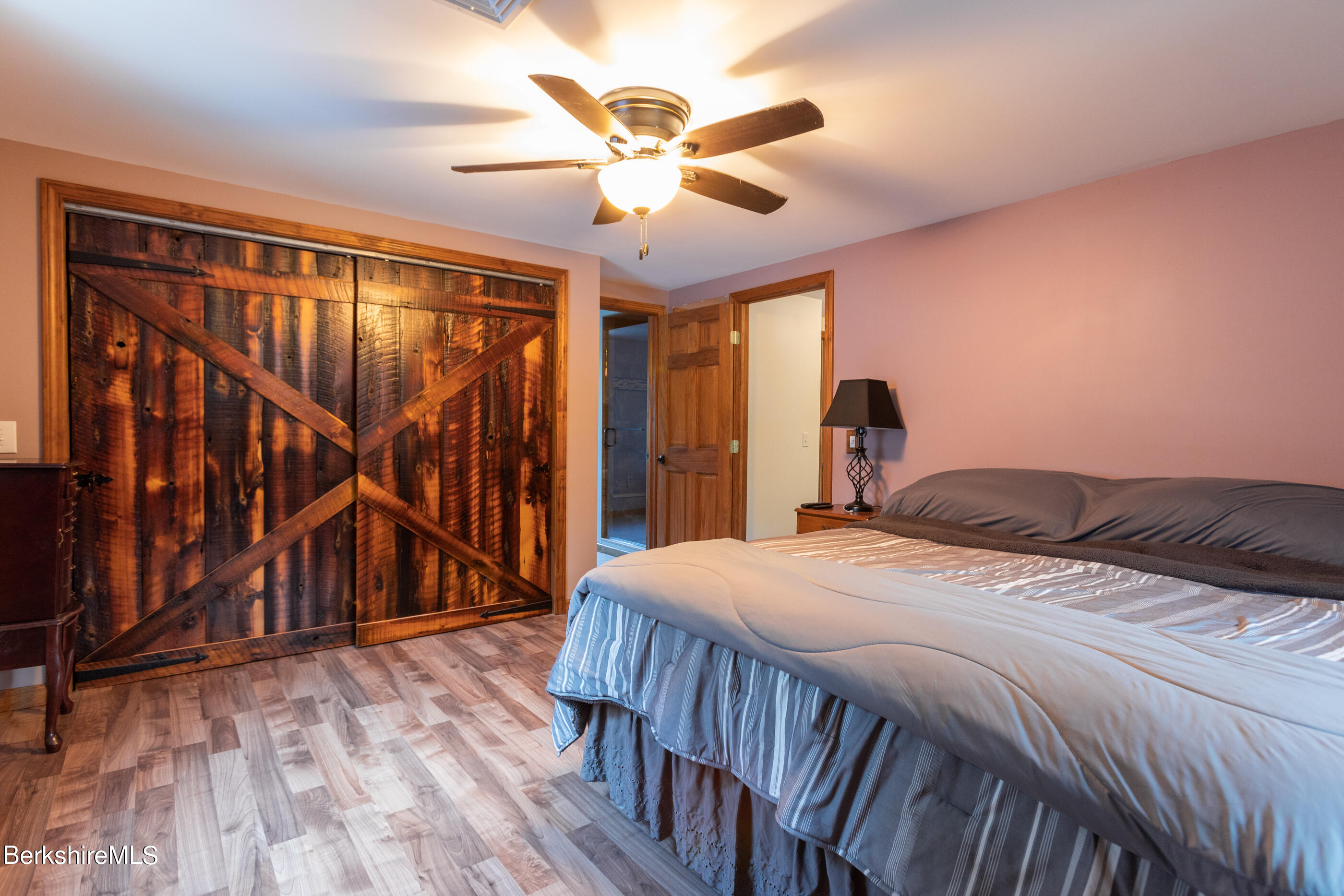 1191 South Washington State Road Washington, MA 01223 - Photo 20 of 41 a bedroom with a bed and a large window with balcony view