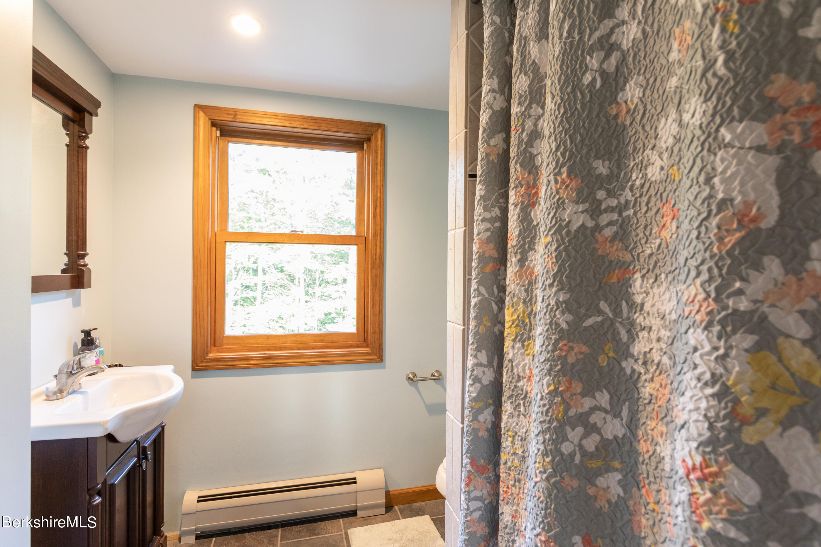 1191 South Washington State Road Washington, MA 01223 - Photo 27 of 41 a bathroom with a window a sink and a toilet