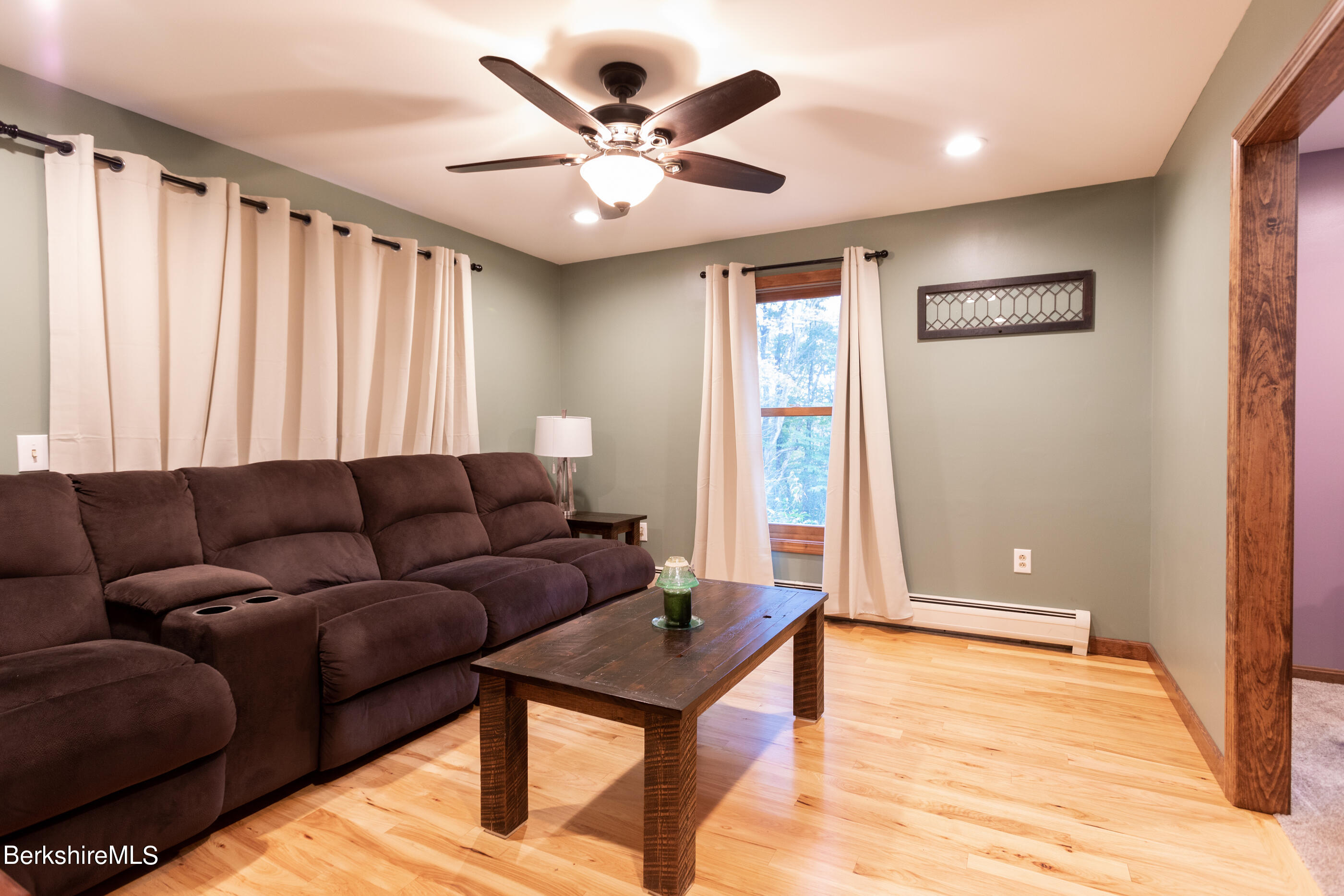 1191 South Washington State Road Washington, MA 01223 - Photo 30 of 41 a living room with furniture and a large window
