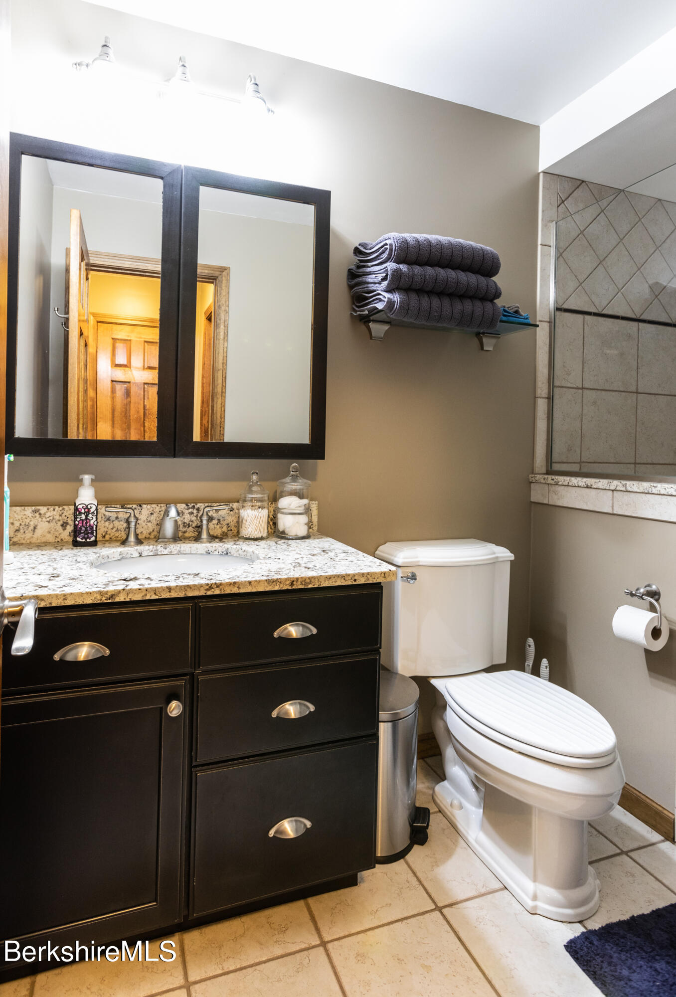 1191 South Washington State Road Washington, MA 01223 - Photo 32 of 41 a bathroom with a granite countertop toilet sink and mirror