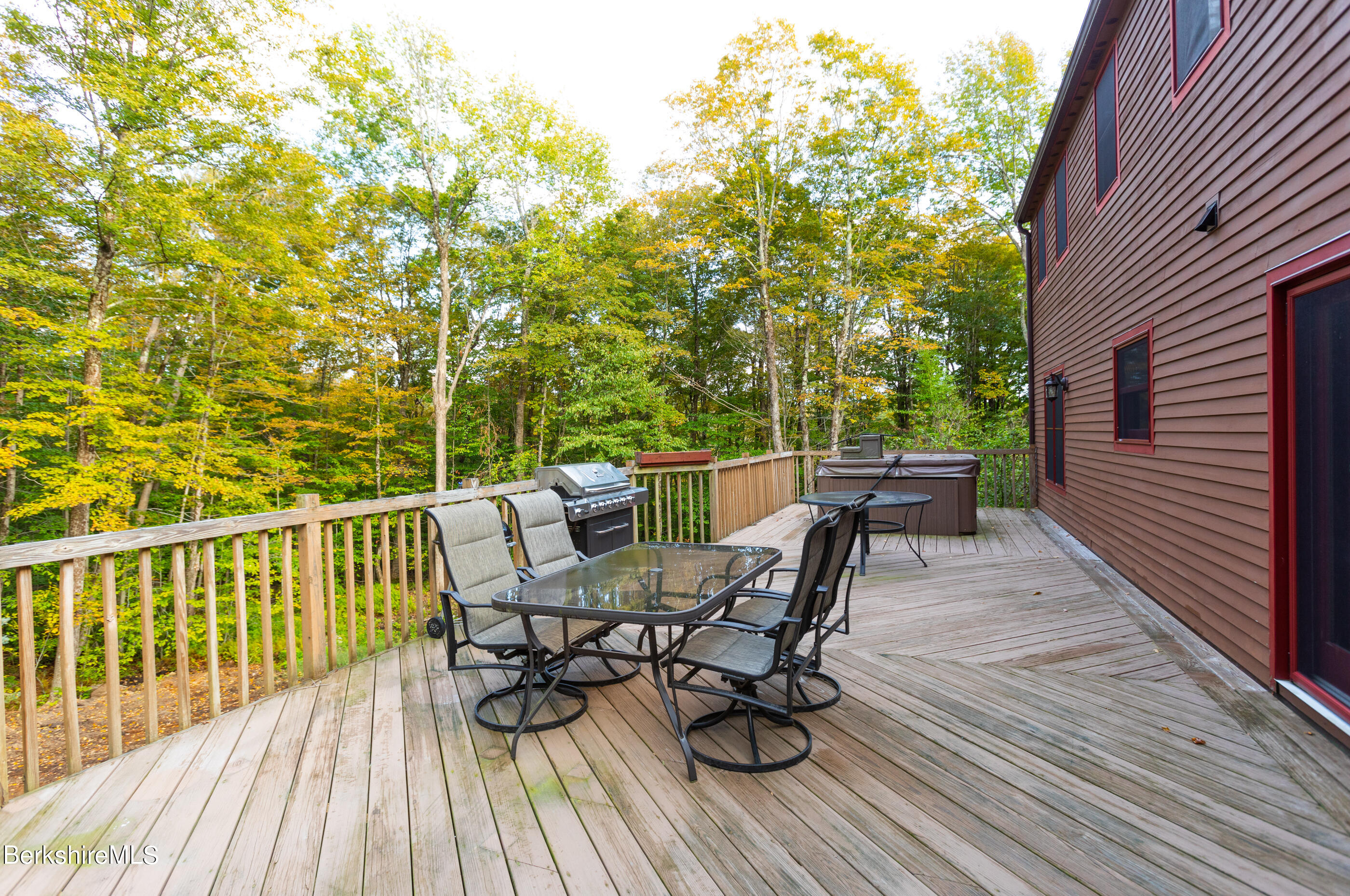 1191 South Washington State Road Washington, MA 01223 - Photo 40 of 41 a view of a deck with table and chairs and wooden floor
