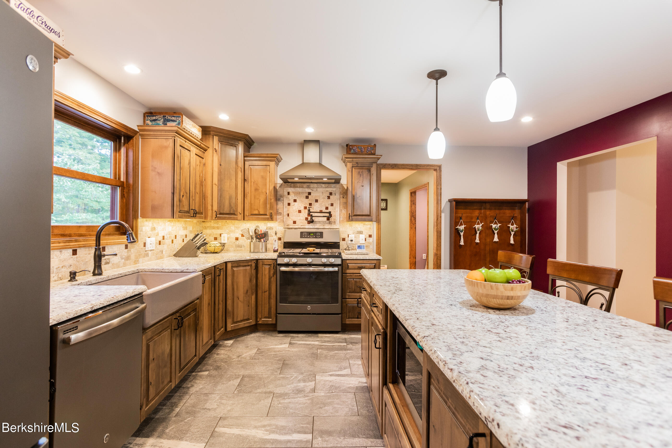 1191 South Washington State Road Washington, MA 01223 - Photo 6 of 41 a kitchen with granite countertop a sink stove and refrigerator
