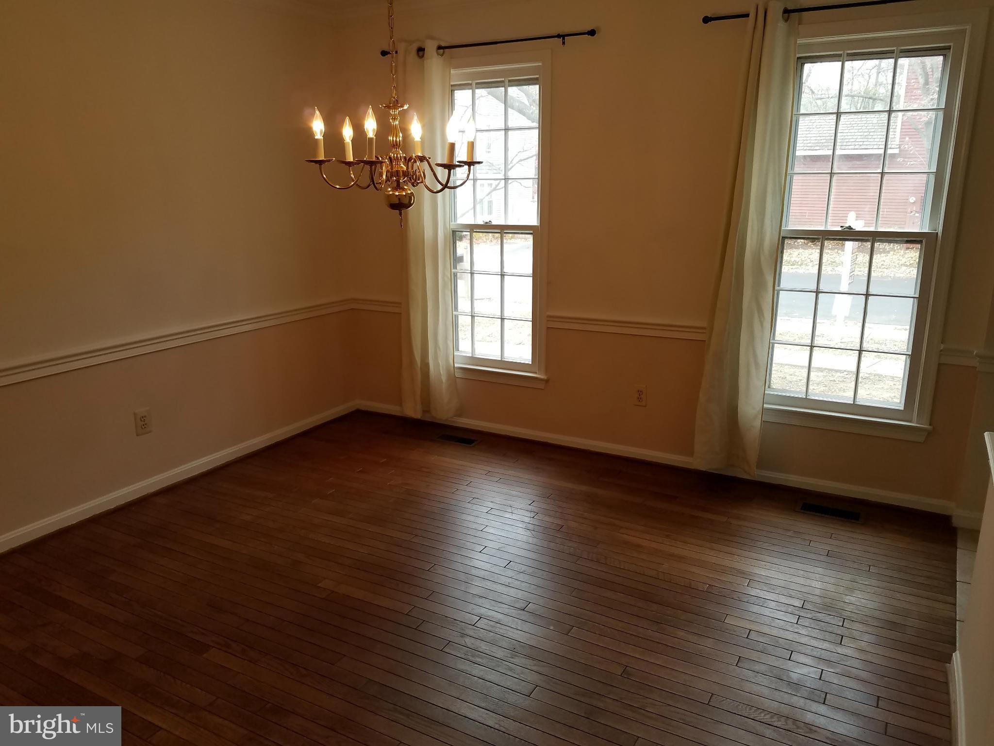 2117 Salt Kettle Way Reston, VA 20191 - Photo 12 of 30 a view of livingroom with window and wooden floor