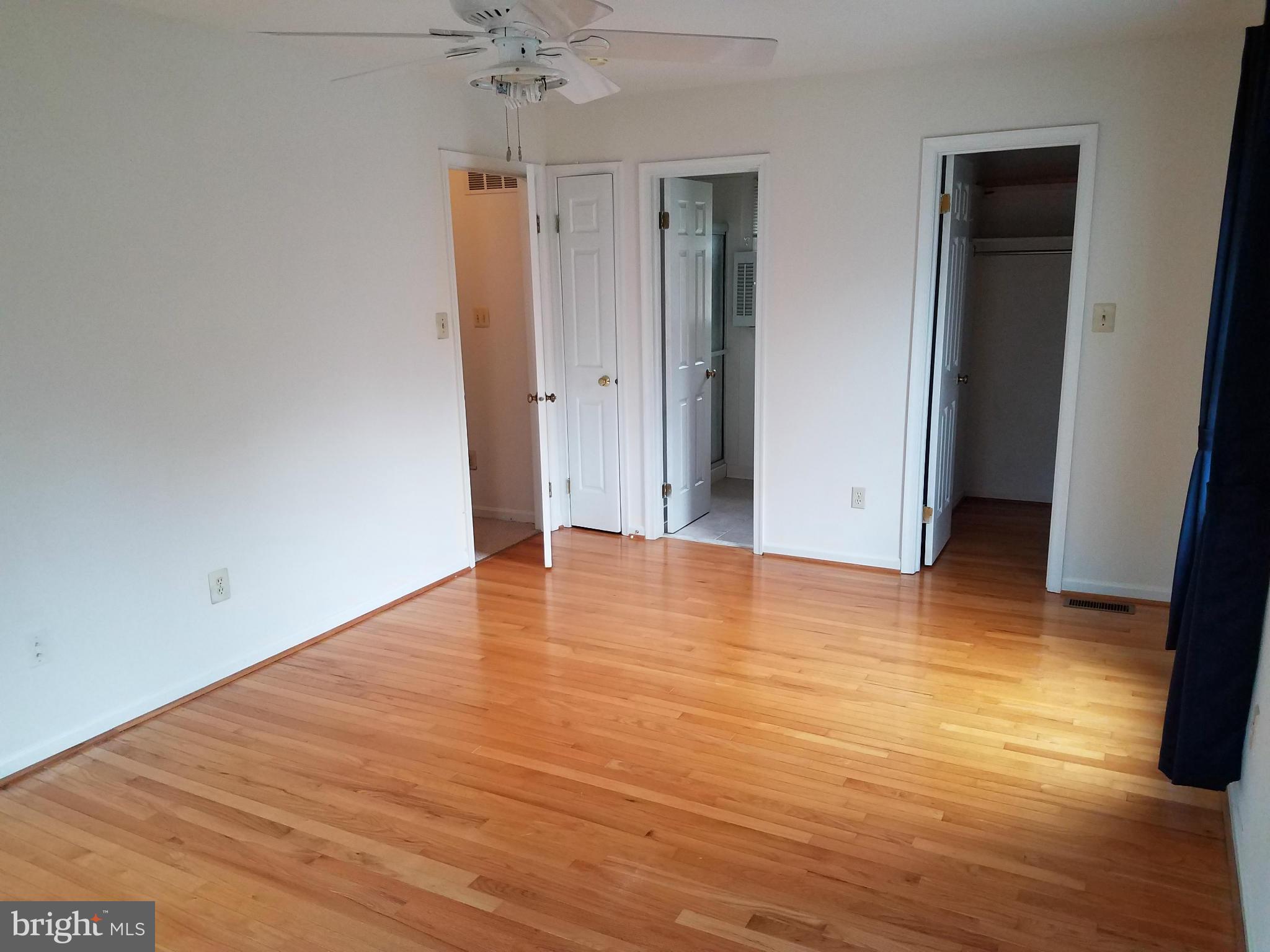 2117 Salt Kettle Way Reston, VA 20191 - Photo 17 of 30 a view of an empty room with wooden floor