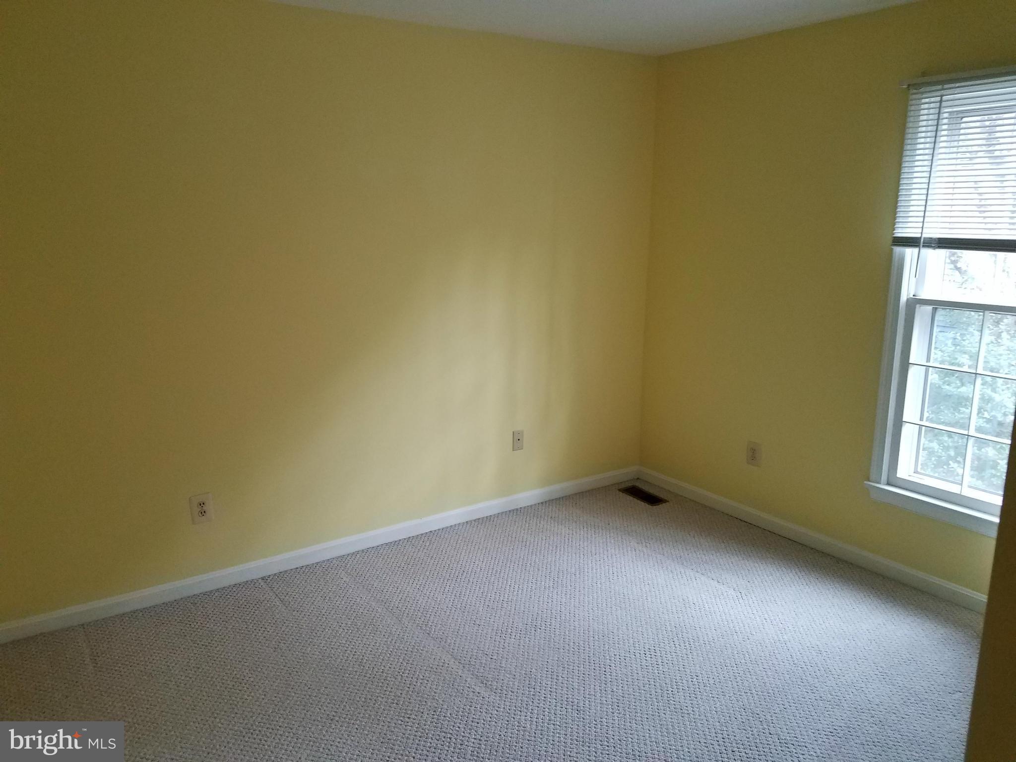 2117 Salt Kettle Way Reston, VA 20191 - Photo 20 of 30 an empty room with windows